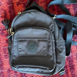 Kipling Alber
3-In-1 Convertible Mini Bag Backpack (Never Used )